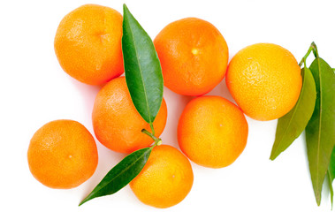 top view on orange fruits with leaves isolated on white backgrou