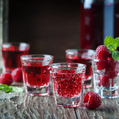 Red cocktail with raspberry and mint