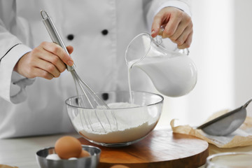Cooking concept. Professional confectioner making delicious dessert, closeup