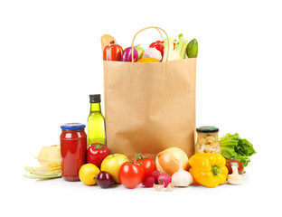 Fresh vegetables and foodstuff on white background