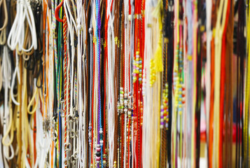 Different colorful leads in pet shop at dog show