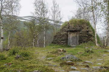 A turf hut (darfegoahti) in a Sami Camp