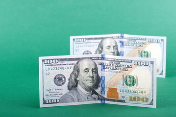 Two hundred dollars banknotes on the isolated background