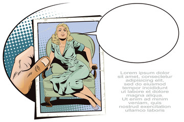 Hand with photo. Stunned girl.