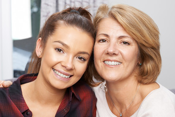 Portrait Of Mature Mother With Teenage Daughter