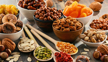 Composition with dried fruits and assorted nuts