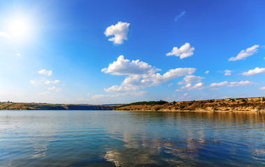 wonderful summer landscape. amazing clouds over the river. 
