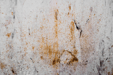 white scratched the surface with rusty stains