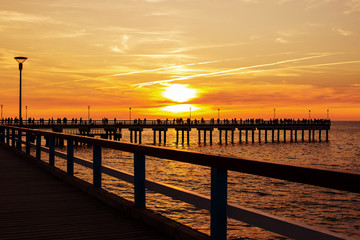 Fototapeta na wymiar pier on the sea. sunset. Palanga