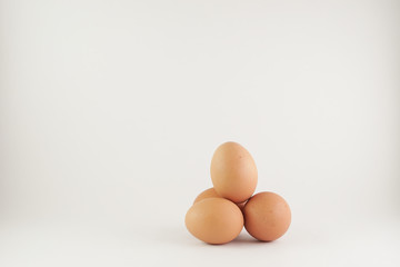 Chicken eggs on white background