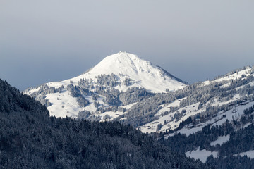 Fototapeta na wymiar Sunrise on mountain top - Hohe Salve near Kitzbühel