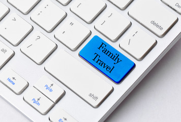 Business concept:  Family Travel on computer keyboard background