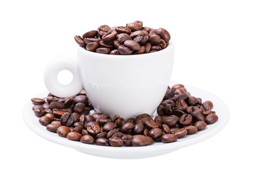 Cup with grains of arabica coffee.