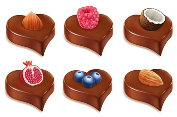 chococolate candy heart with, hazelnut, coconut, raspberry, blueberry, almond
