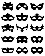 Black silhouette of festive masks in black on a white background