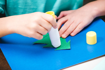 Child making christmas card