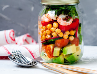 Salad with shrimp and chickpeas in the jar.  Love for a healthy food concept