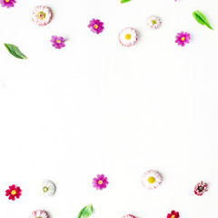 Fototapeta na wymiar Chamomile buds, leaves, petals on white background. Flat lay, top view