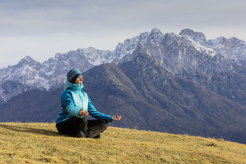 Relaxing with meditation in the nature.