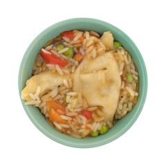 Vegetarian potstickers meal in a green bowl isolated on a white background.