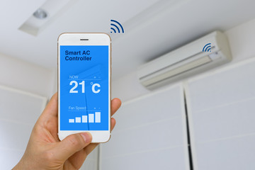 IOT Concept, Remotely Controlling Smart Air Conditioner with App on Smartphone