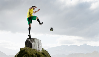 Soccer player outdoors . Mixed media