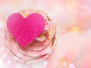Fototapeta premium Pink heart cupcake bokeh effect