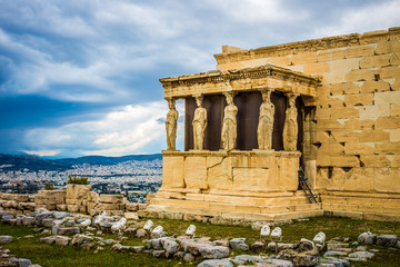 caryatids against dramatic sky, Athens