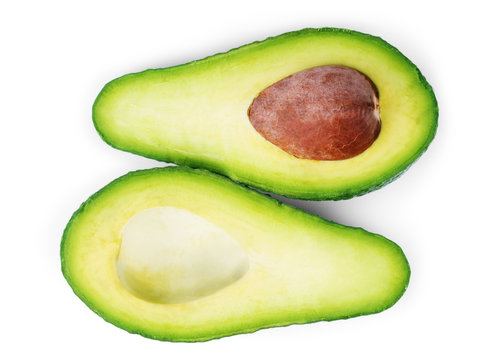 Two Slices Of Avocado Isolated On The White Background. One Slic