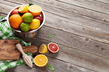 Fresh citrus fruits in colander