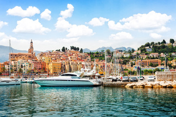 colorful houses of Menton old town harbor at summer day, France, retro toned