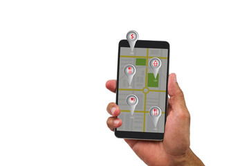 Man's hand holding mobile phone with map and navigation symbol on screen on white background