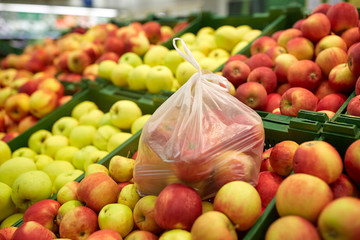 ripe apples at grocery store or market
