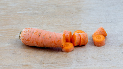 Carrot on wood background