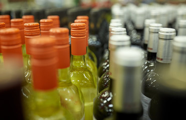 close up of bottles at liquor store