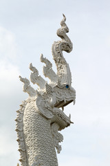 Fototapeta premium Old Naga statue in thai temple, Wat Hyua Pla Kang, Chiangrai, Thailand.
