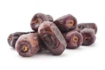 Bunc of date palm and hazelnuts, dried dates isolated on white background