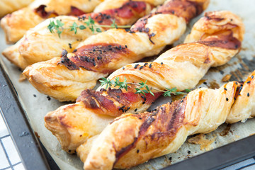 Bacon sticks pastry with black sesame and thyme