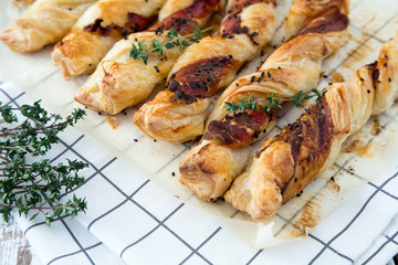 Bacon sticks pastry with black sesame and thyme