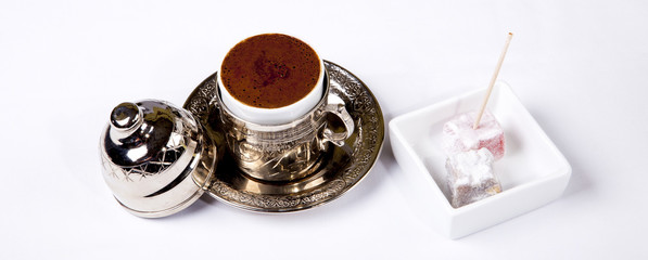 Turkish Coffee and Turkish Delight isolated on white