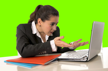 businesswoman wearing business suit working on laptop computer green chroma key
