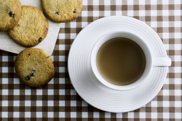 Coffee and Cookies on table.