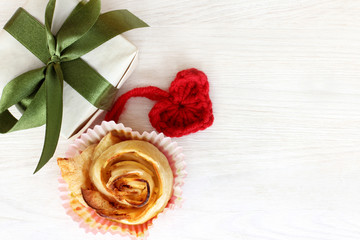 set for the day of lovers/ holiday gift with a soft hand knitted heart and Cake in the form flower 