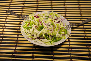 Chinese cabbage salad with green pepper and onion