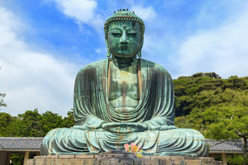 The Great Buddha in Kamakura.  Located in Kamakura, Kanagawa Prefecture Japan.There are pigeon to Buddha's head.