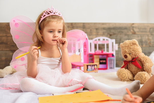 Kid is creating pictures at home - Powered by Adobe