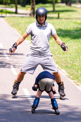 Fototapeta na wymiar Roller skating in the park
