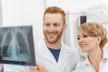 Happy physician at working place