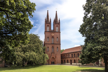 Germany, Mecklenburg-Western Pomerania, near Goldberg, Dobbertin: Abbey with crosses, clock. It is a former Benedictine monastery, then a community of nuns, later a women's collegiate foundation.