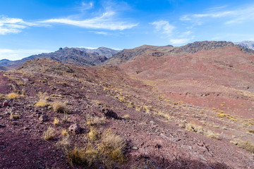 Red mountains seen from hills above Abyaneh - one of the oldest villages in Iran